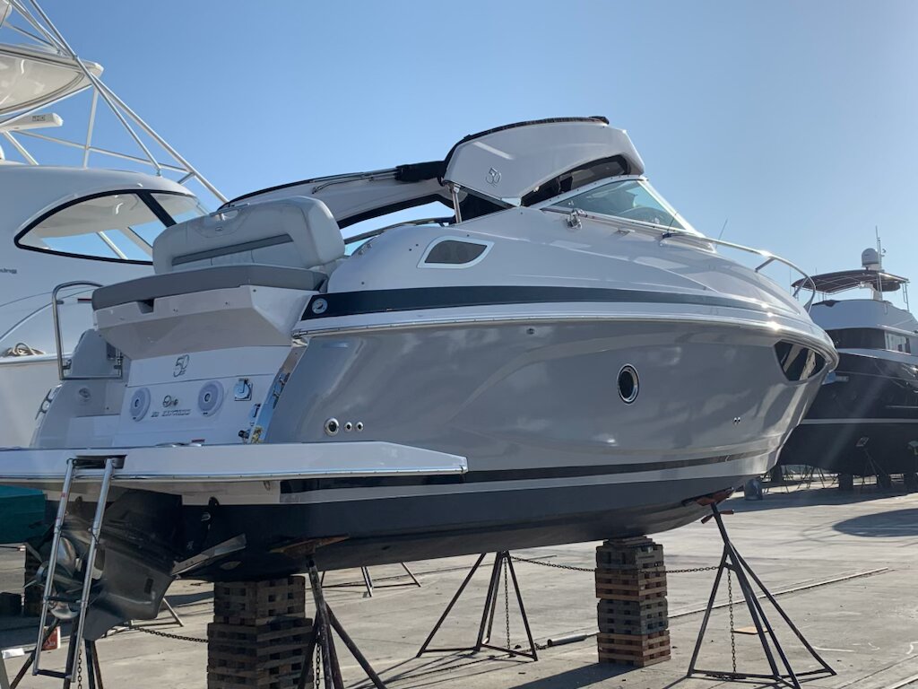 Regal sport yacht side hull wrap with custom graphics by WrapNSigns